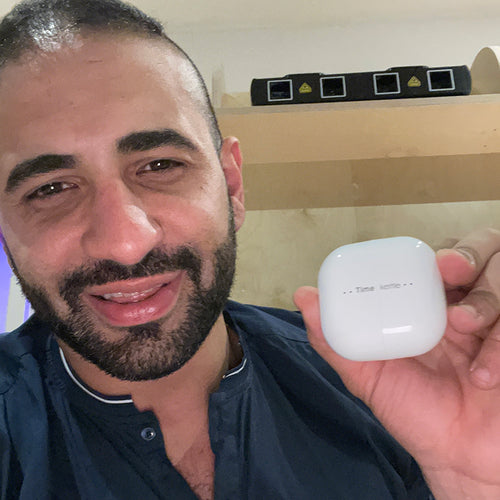 A man using Timekettle best offline translator earbuds3